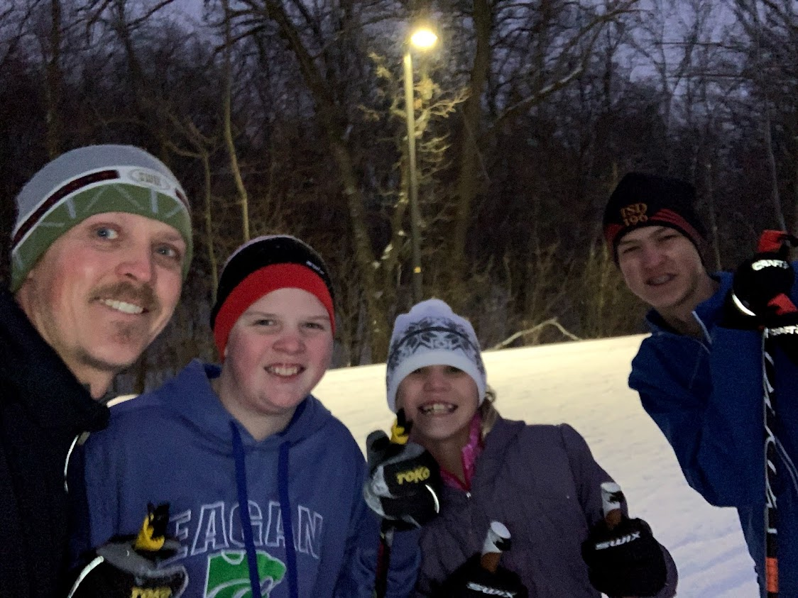 Nick Hall and three skiers